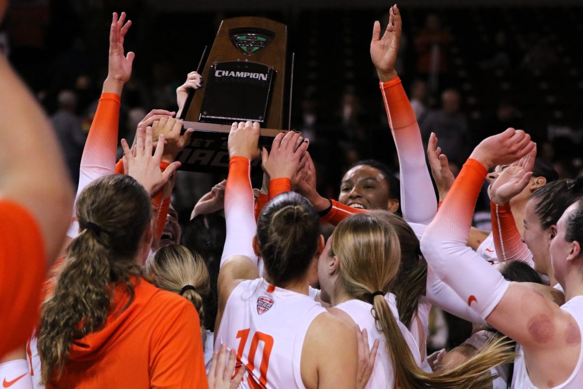 Bowling Green, OH - Falcons hoisting the 2024 Mid-American Conference (MAC) regular-season title at the Stroh Center in Bowling Green, Ohio.