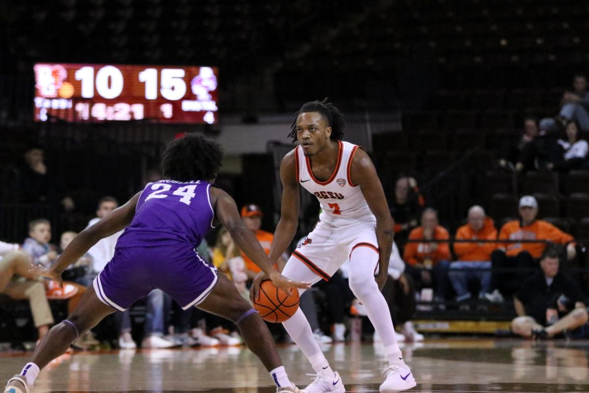 Bowling Green, OH - Falcons Junior Guard Javontae Campbell (2) takes a one-on-one match-up to score at the Stroh Center in Bowling Green, Ohio.