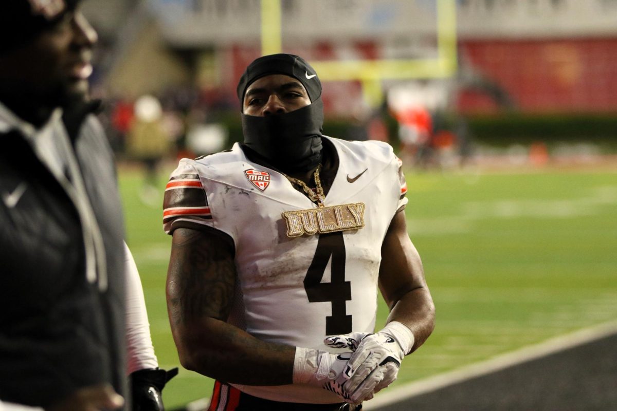 Muncie, IN - Falcons junior running back Terion Stewart (4) wears his chain after a big win against Ball State at Scheumann Stadium in Muncie, Indiana.