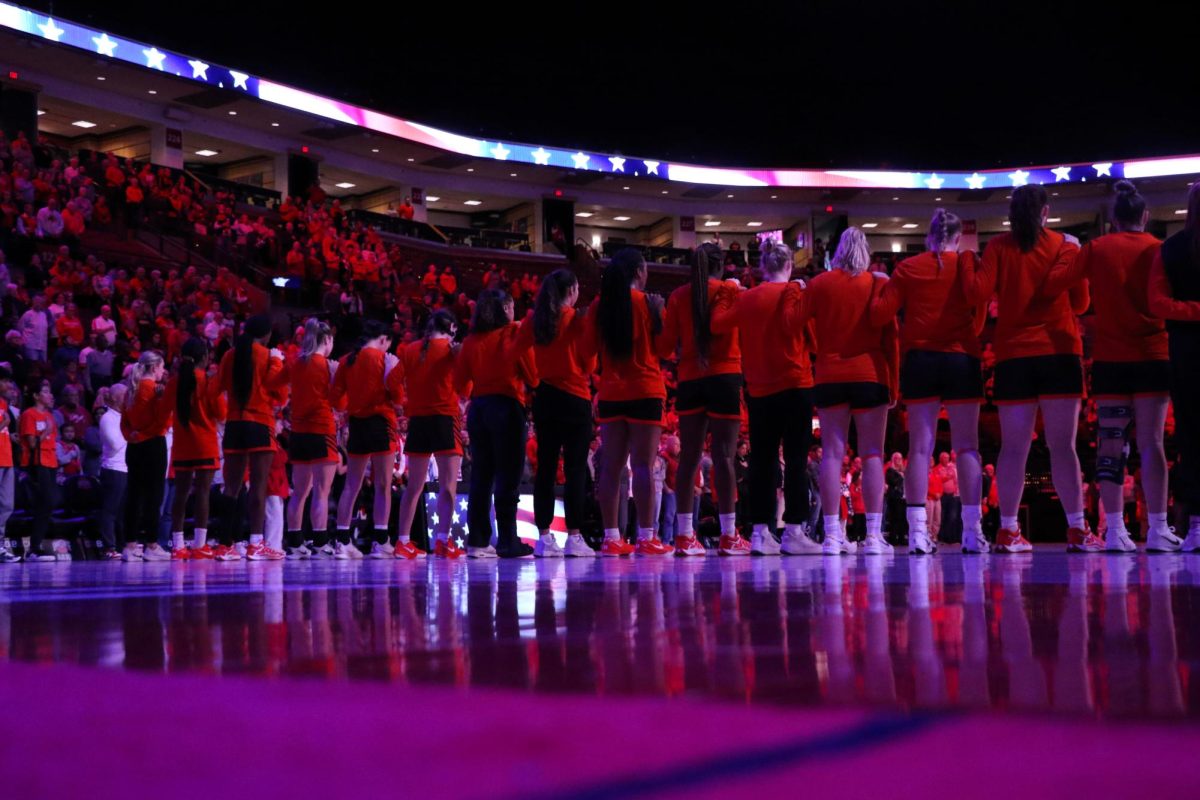 Columbus, OH - Falcons stand together for the National Anthem before their game against the Buckeyes at Schottenstein Center in Columbus, Ohio.