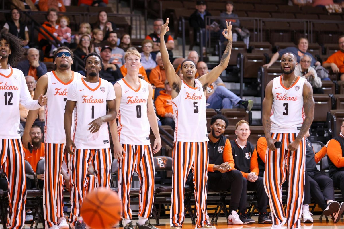 BGSU men's basketball celebrating at Hoops Night at the Stroh Center.