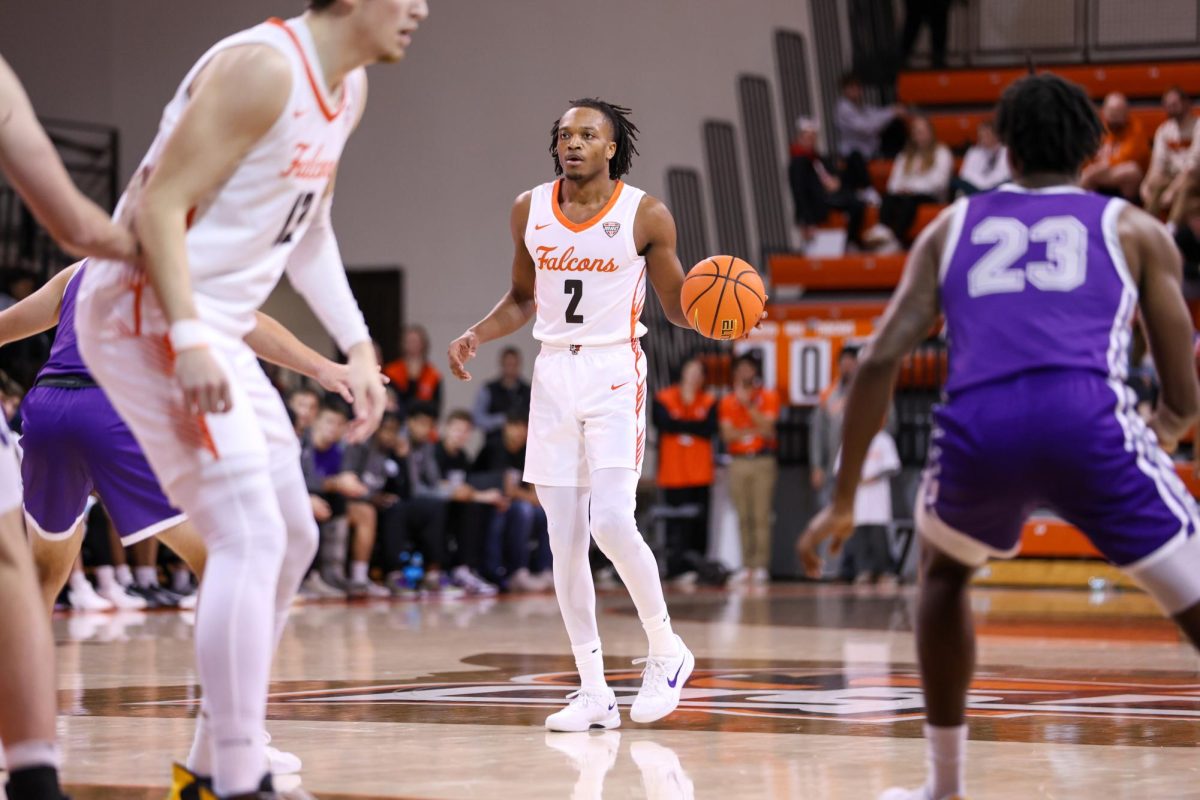 Bowling Green, OH - Falcons junior guard Javontae Campbell (2) makes his way down the court as the matchup against Taylor University nears the end at the Stroh Center in Bowling Green, Ohio.