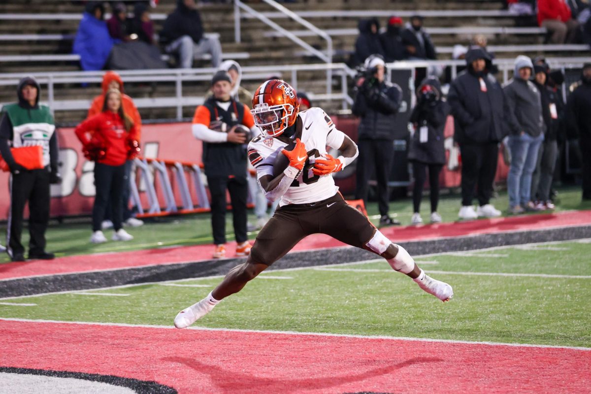 Muncie, IN - Falcons junior wide receiver Rahkeem Smith (16) comes down with the ball in the end zone to put away the Cardinals at Scheumann Stadium in Muncie, Indiana