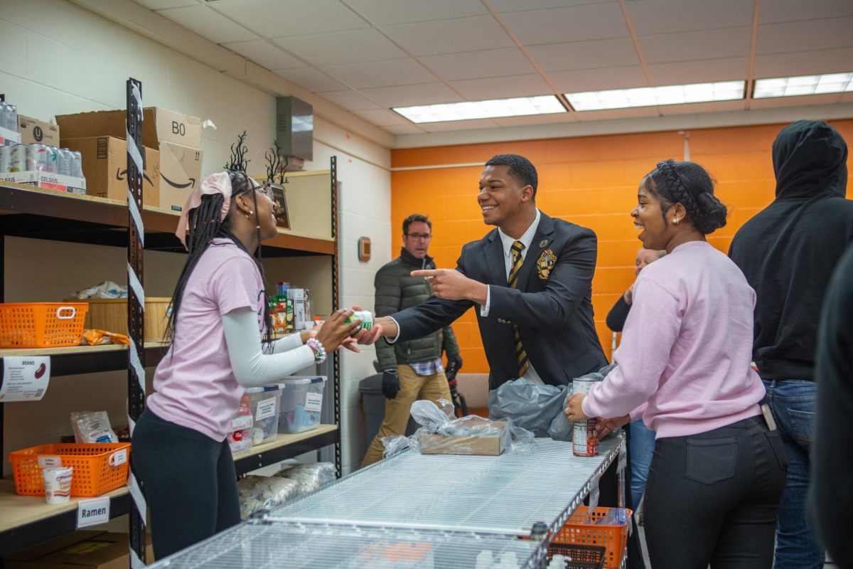 Students volunteer at the Falcon Food Pantry on campus via Bowling Green State University