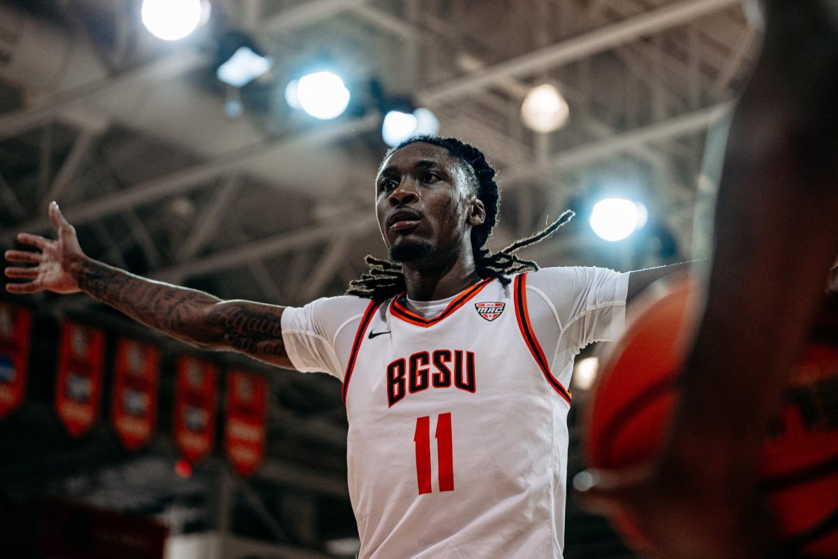 Bowling Green, OH – Falcons redshirt freshman forward Jamai Felt (11) prepares to block a Wildcat inbound at the Stroh Center in Bowling Green, Ohio