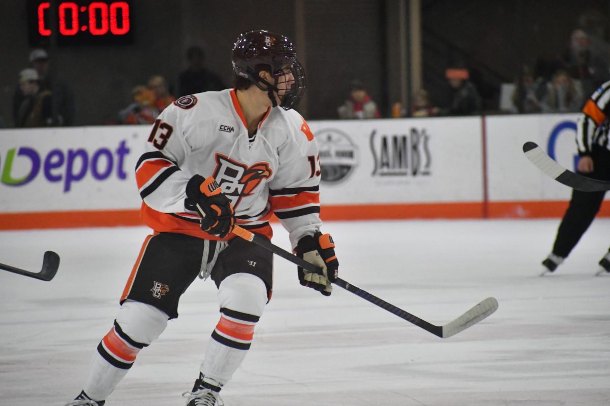 Bowling Green, OH - Falcons junior forward Brett Pfoh (13) at Slater Family Ice Arena in Bowling Green, Ohio.