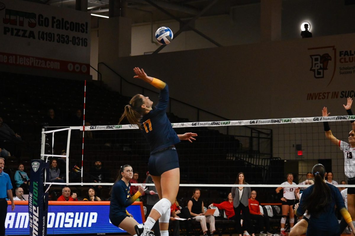 Bowling Green, OH - Rockets fifth year setter Taylor Alt (17) hits the ball at the Stroh Center in Bowling Green, Ohio.