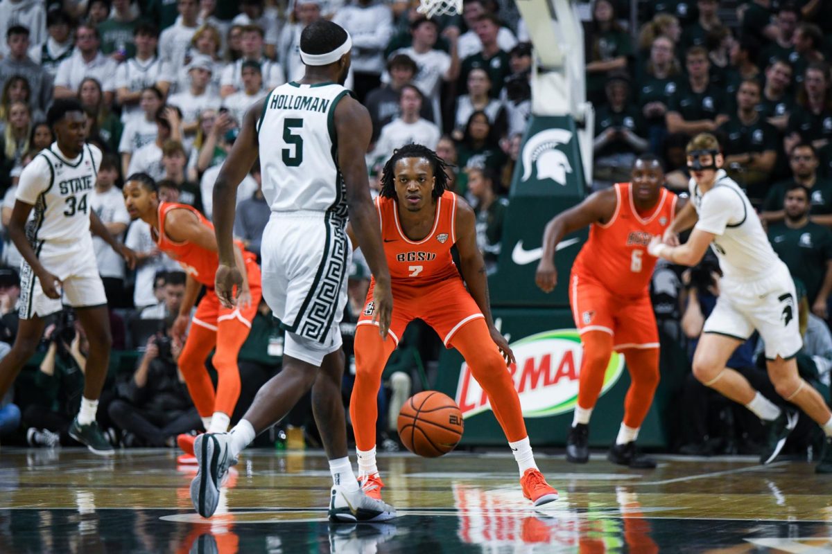 Lansing, MI - Falcons junior guard Javontae Campbell (2) guarding the perimeter at Breslin Center in Lansing, Michigan.