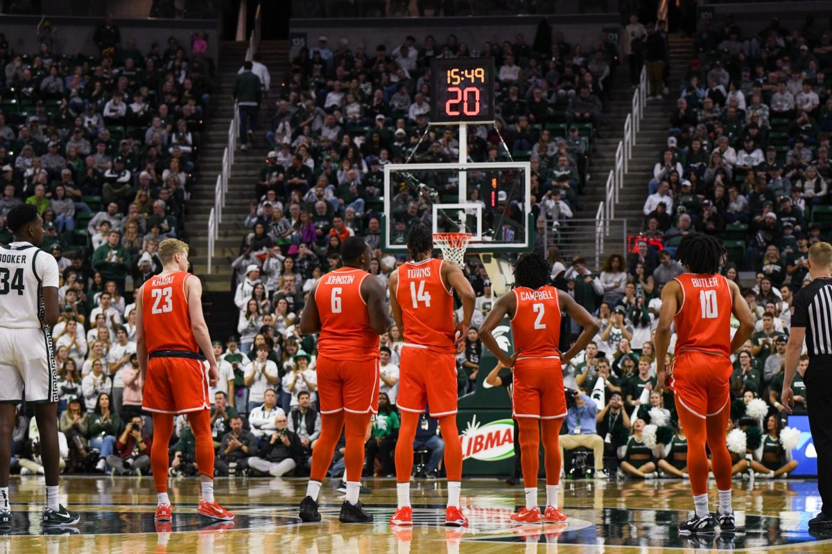 Lansing, MI - Falcons wait for the Spartans to come out of a timeout at Breslin Center in Lansing, Michigan.