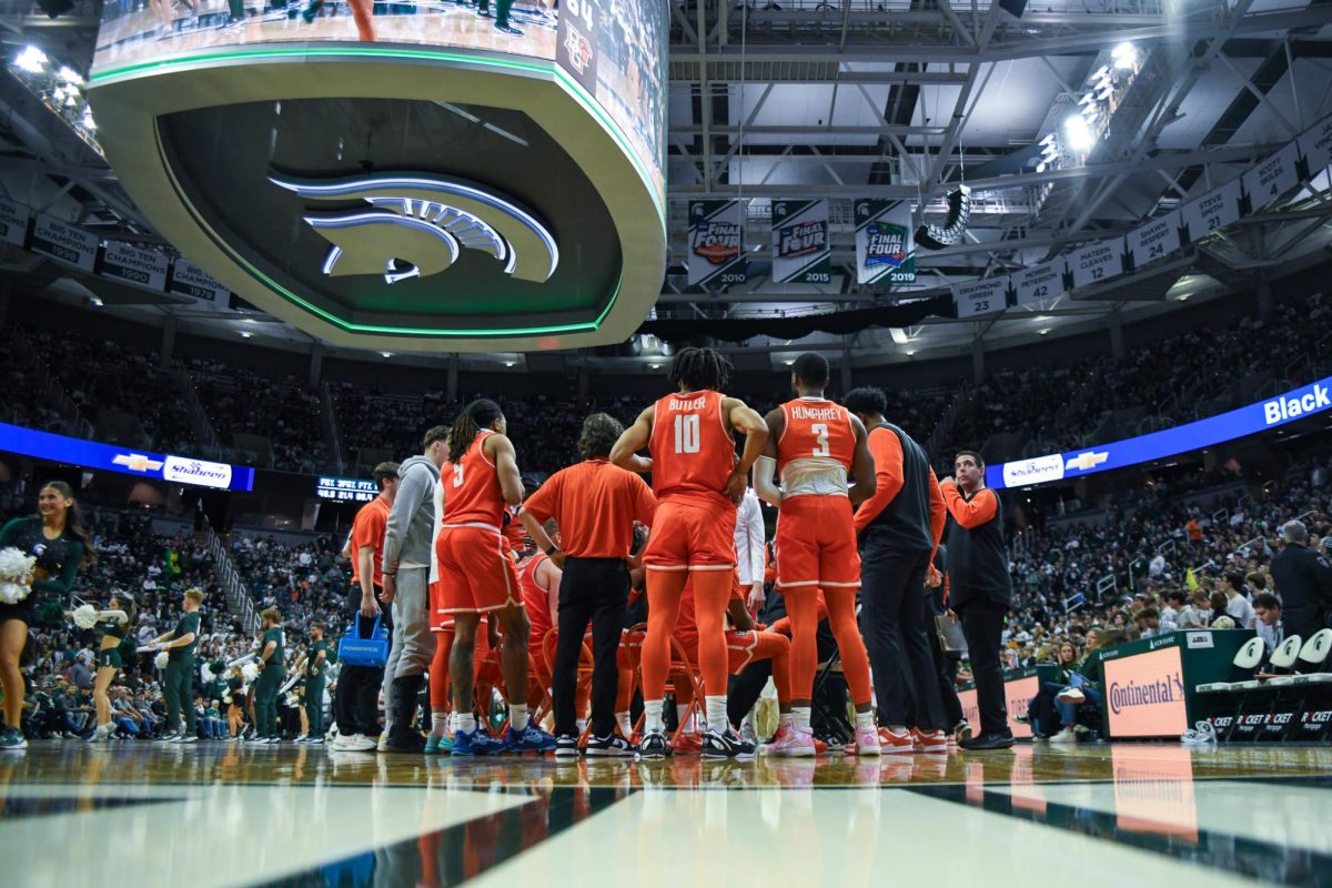 Lansing, MI - Falcons in the huddle reading the plays at Breslin Center in Lansing, Michigan.