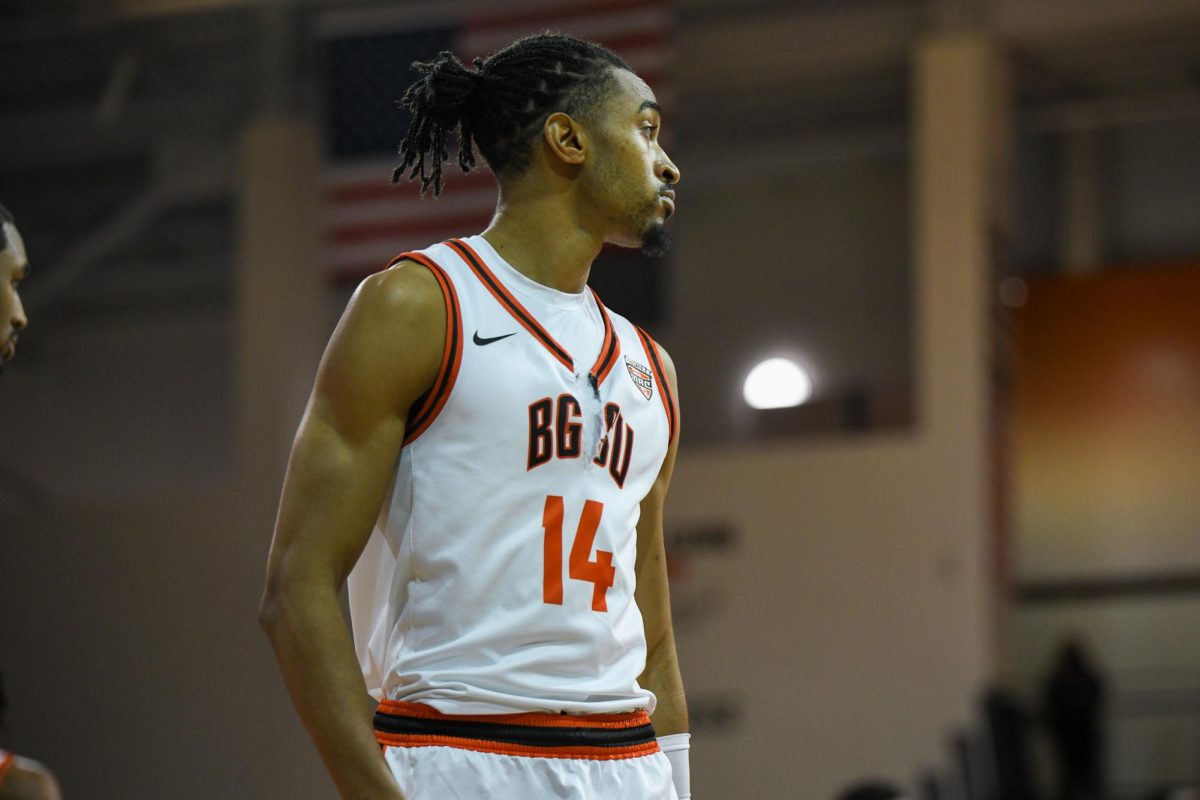 Bowling Green, OH - Falcons senior forward Sam Towns (14) returning to the court after halftime at the Stroh Center in Bowling Green, Ohio.