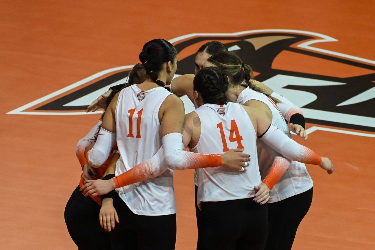 Bowling Green, OH - Falcons huddle during a timeout at the Stroh Center in Bowling Green, Ohio.