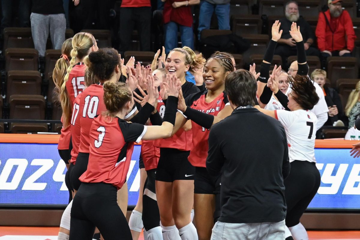 Bowling Green, OH - Cardinals celebrating after making it to MAC Tournament Championship game at the Stroh Center in Bowling Green, Ohio.