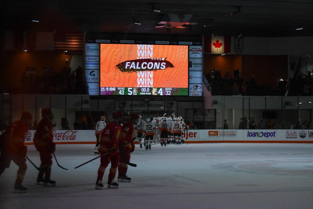 Bowling Green, OH - Falcons celebrating their win over the Bulldogs at Slater Family Ice Arena in Bowling Green, Ohio.