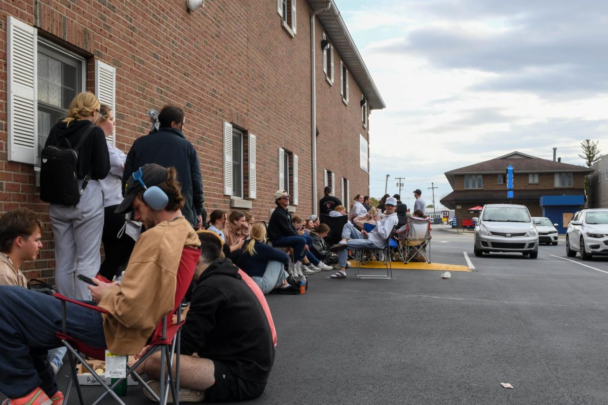 Greenbriar tenant-hopefuls wait outside of the Greenbriar offices to reserve an apartment during open rent 