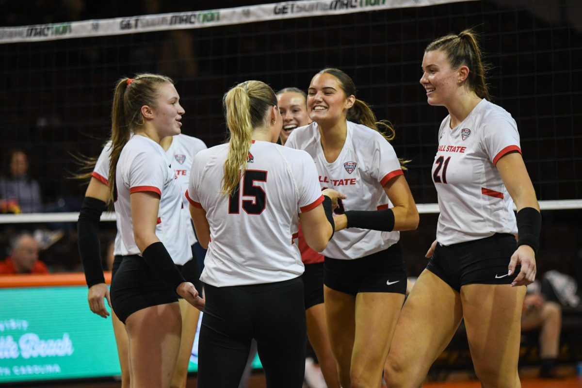 Bowling Green, OH - Cardinals celebrating winning the point after a long rally at the Stroh Center in Bowling Green, Ohio.