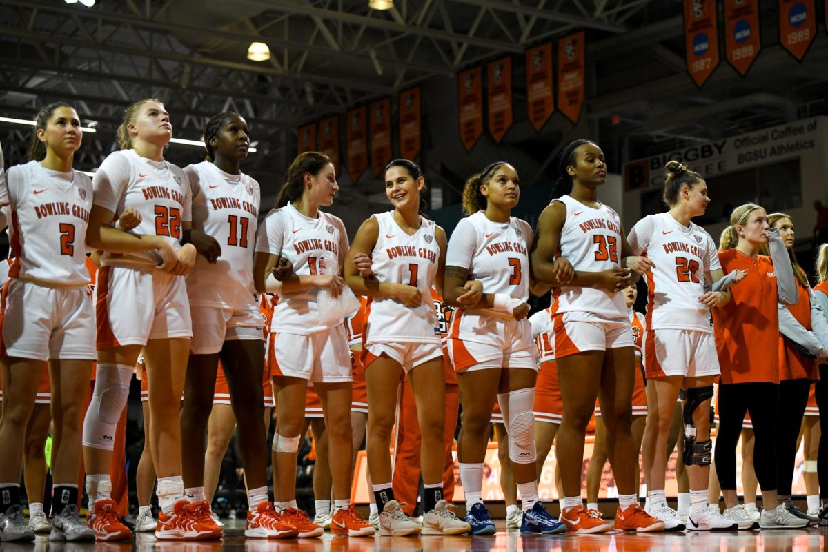 Bowling Green, OH - Falcons lineup singing the alma mater at the Stroh Center in Bowling Green, Ohio.