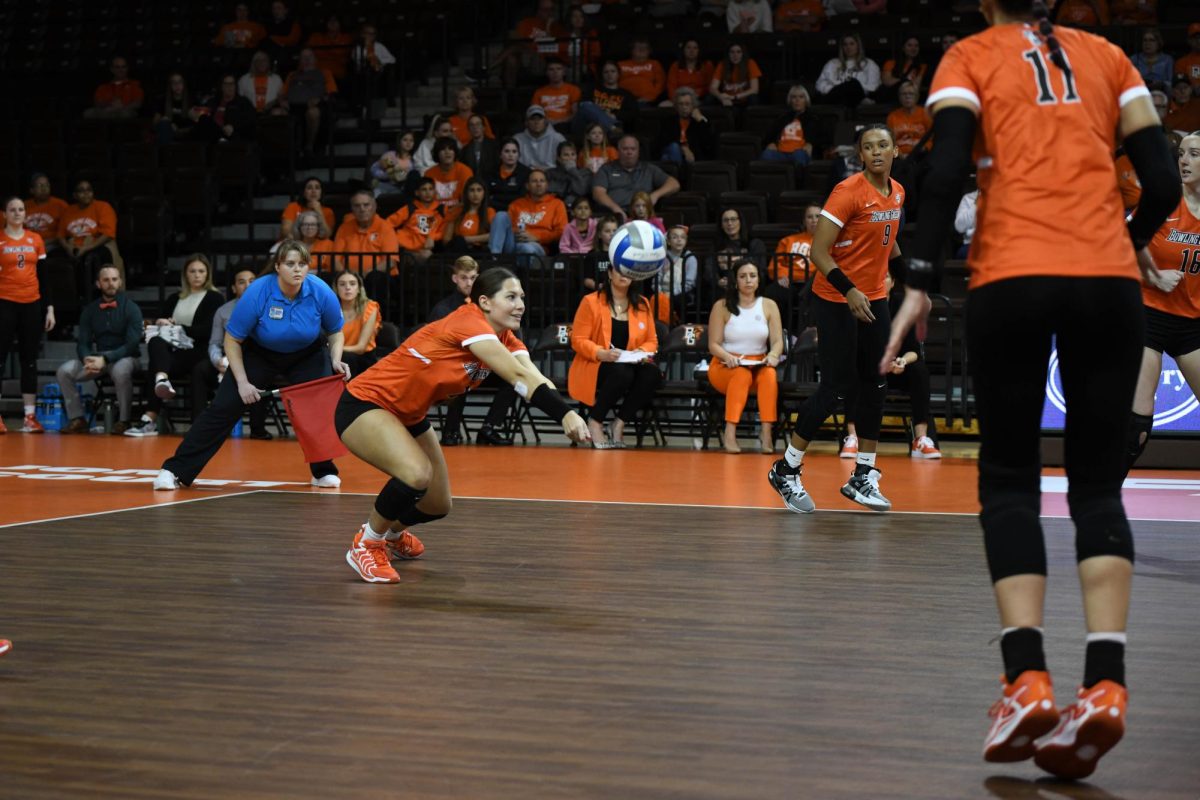 Bowling Green, OH - Falcons freshman defensive specialist Sydnie Hernandez (1) receiving the serve from the rockets at the Stroh Center in Bowling Green, Ohio.
