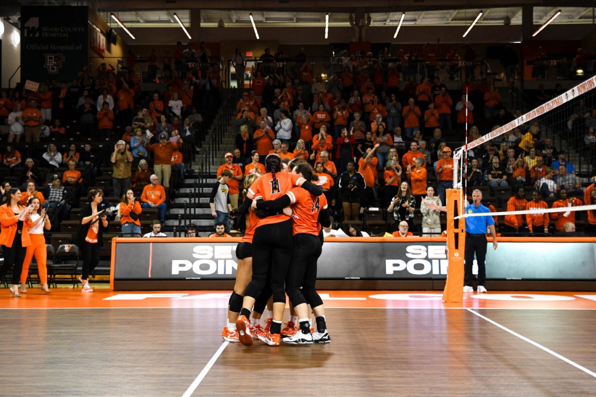 Bowling Green, OH - Falcons celebrating after taking the first set from the Falcons at the Stroh Center in Bowling Green, Ohio.
