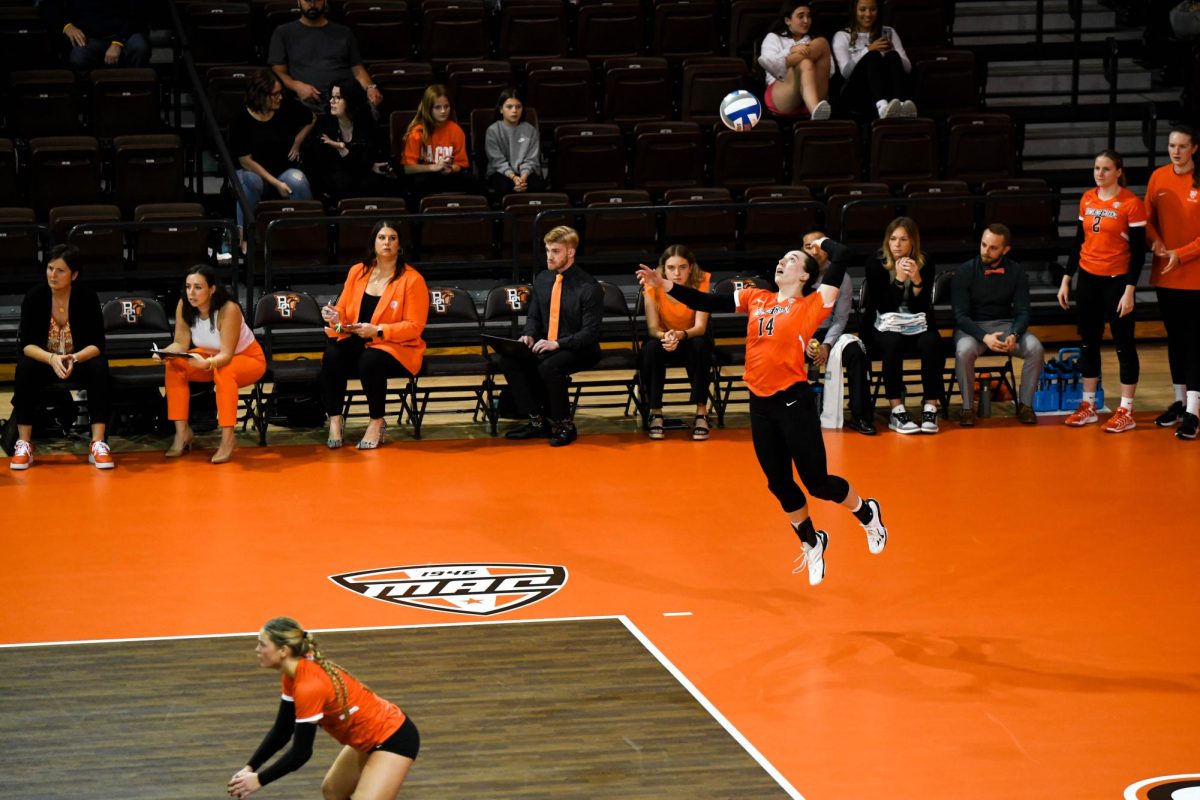 Bowling Green, OH - Falcons junior opposite Lauren Hovey (14) serving to the Rockets at the Stroh Center in Bowling Green, Ohio.
