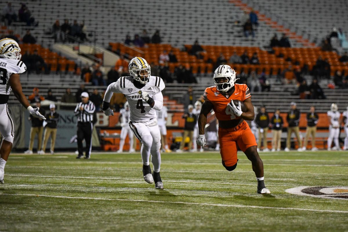 Bowling Green, OH - Falcons junior running back Terion Stewart (4) making his way around the Broncos defense at Doyt L. Perry Stadium in Bowling Green, Ohio.