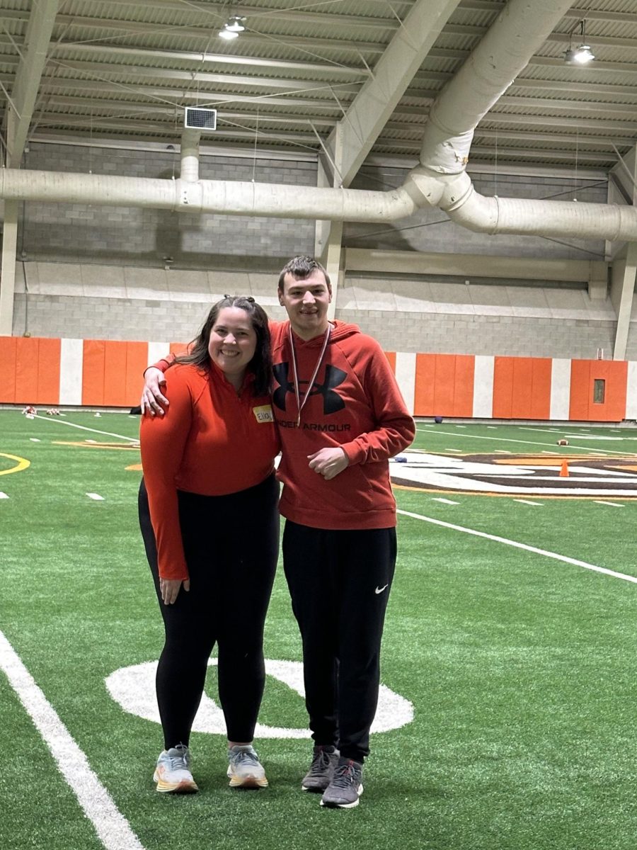 Aaron Cowdrey, right, enjoys making friendships with his fellow RallyPlayers and RallyPals. Photo by BGSU RallyCap Sports.