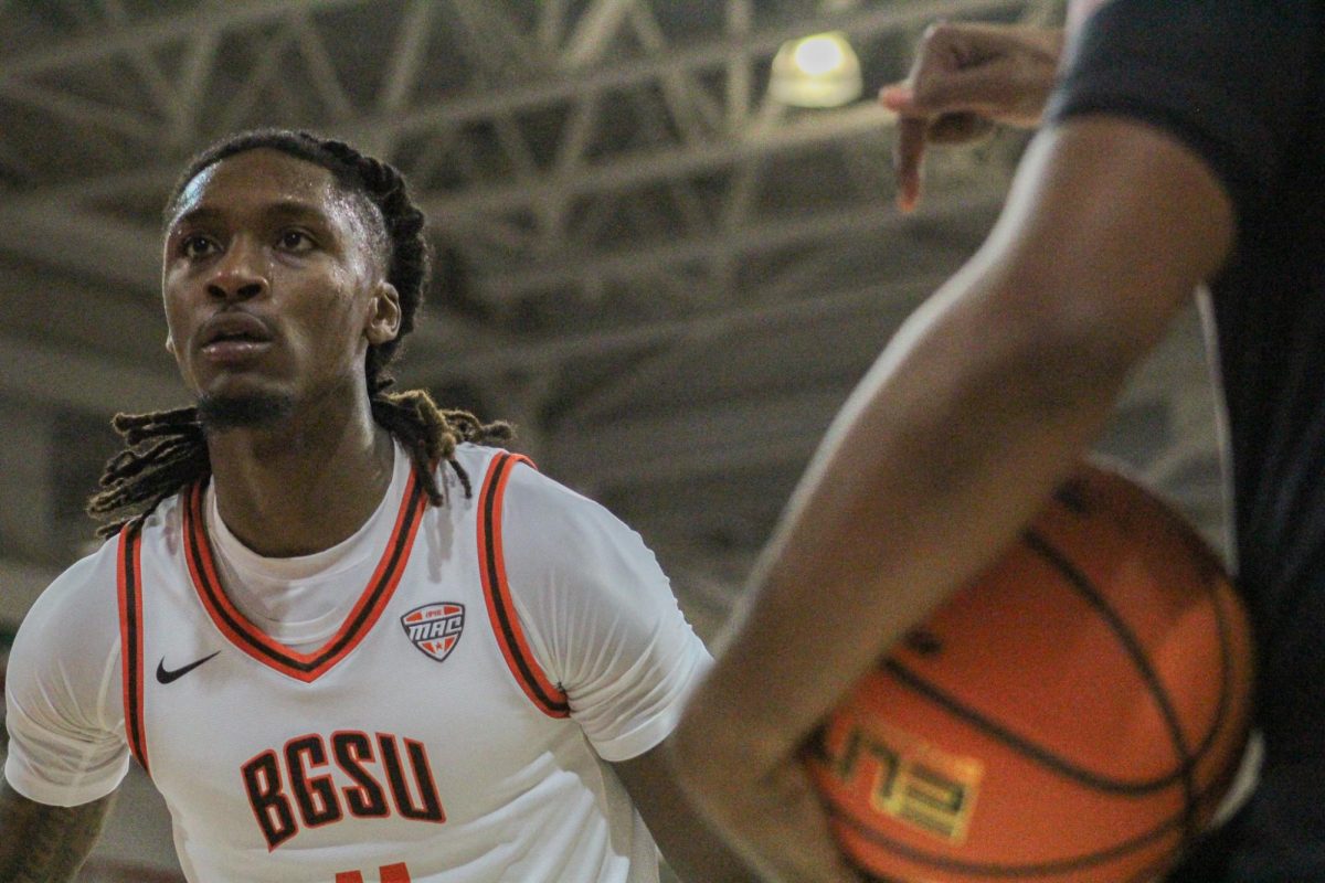 Bowling Green, OH – Falcons redshirt freshman forward Jamai Felt (11) planning a inbound play at the Stroh Center in Bowling Green, Ohio