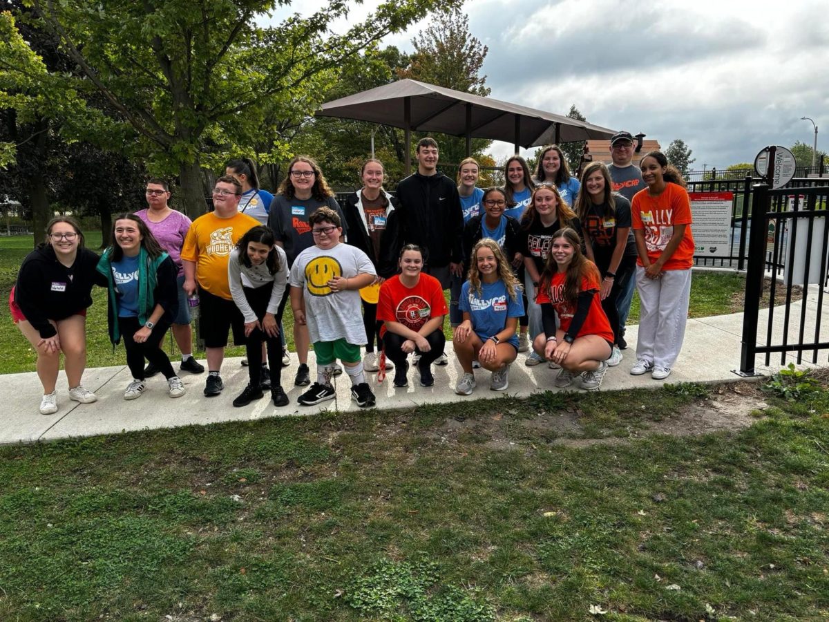 A group of RallyPlayers, the athletes involved with the group, and RallyPals, the student volunteers. Photo by BGSU RallyCap Sports.