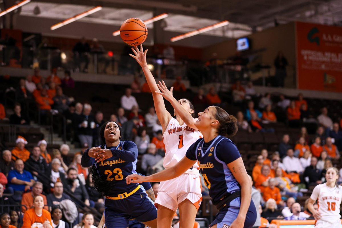 Bowling Green, OH - Falcons senior guard Amy Velasco (1) sends the ball towards the basket against the Golden Eagles at the Stroh Center in Bowling Green, Ohio.