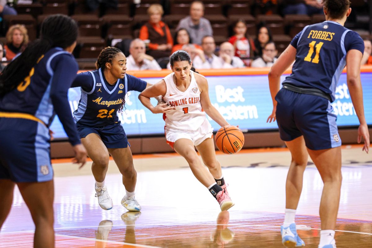 Bowling Green, OH - BGSU senior guard Amy Velasco (1) drives through the lane against the Golden Eagles at the Stroh Center in Bowling Green, Ohio.