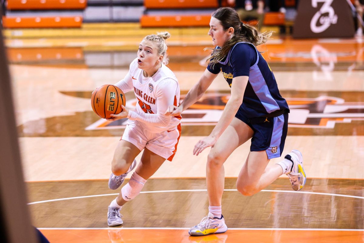 Bowling Green, OH - Falcons fifth year guard Lexi Fleming (25) drives towards the hoop against the Golden Eagles at the Stroh Center in Bowling Green, Ohio.