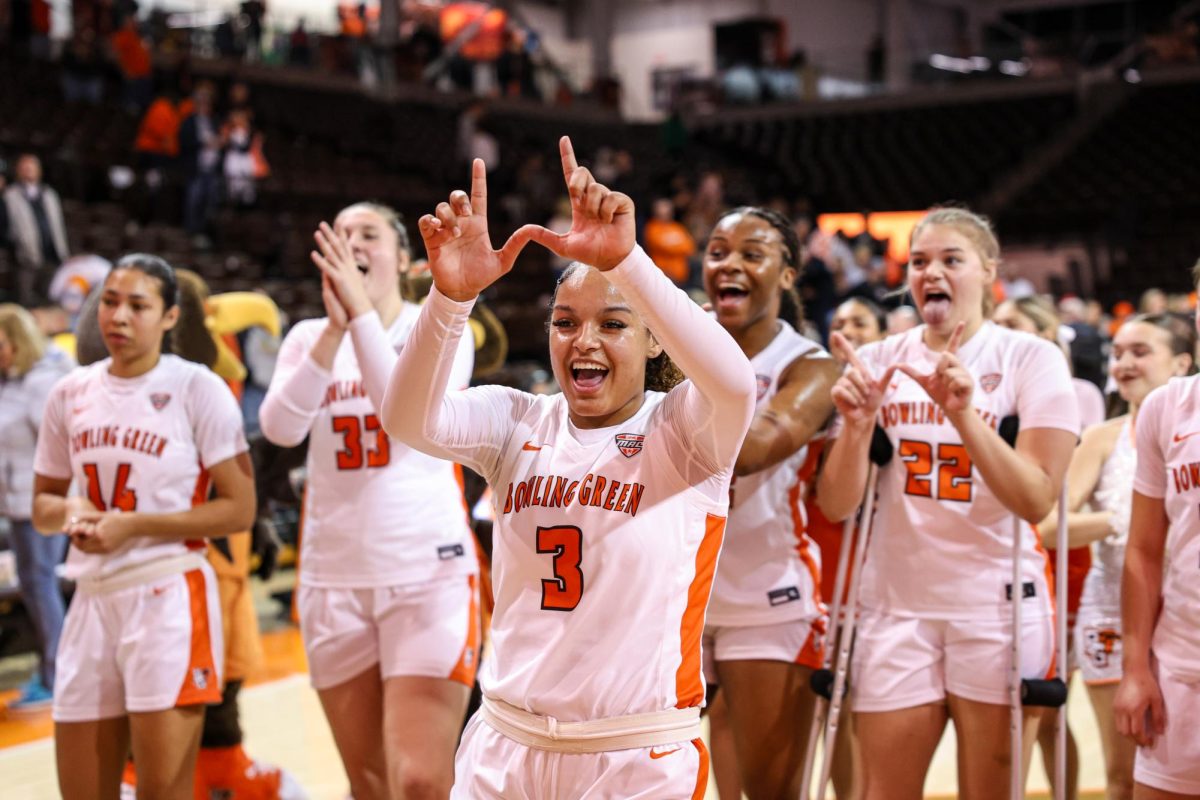 Bowling Green, OH - Falcons freshman guard Johnea Donahue (3) celebrates a victory over the Golden Eagles at the Stroh Center in Bowling Green, Ohio.