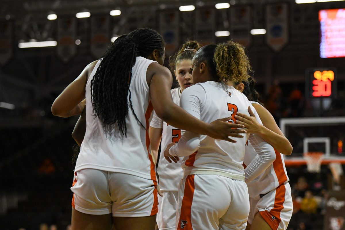 Bowling Green, OH - Falcons huddling for an inbound play at the Stroh Center in Bowling Green, Ohio.