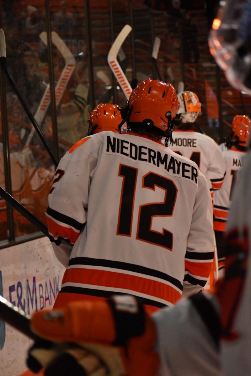 Bowling Green, OH - Falcons senior forward Jackson Niedermayer (12) at Slater Family Ice Arena in Bowling Green, Ohio.