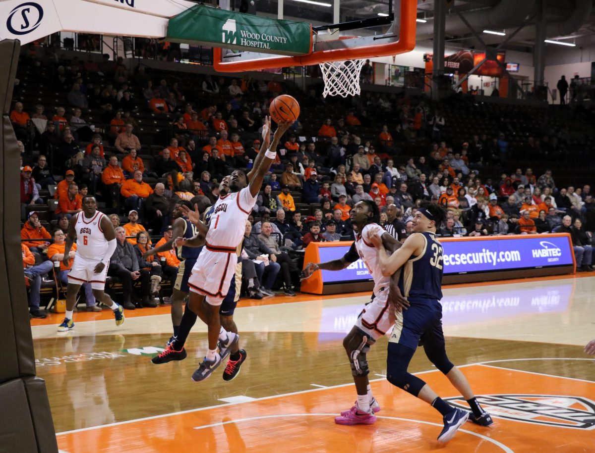 Bowling Green, Ohio- Falcons Senior Guard Trey Thomas (1) makes a tough left-handed layup against Akron at the Stroh Center.