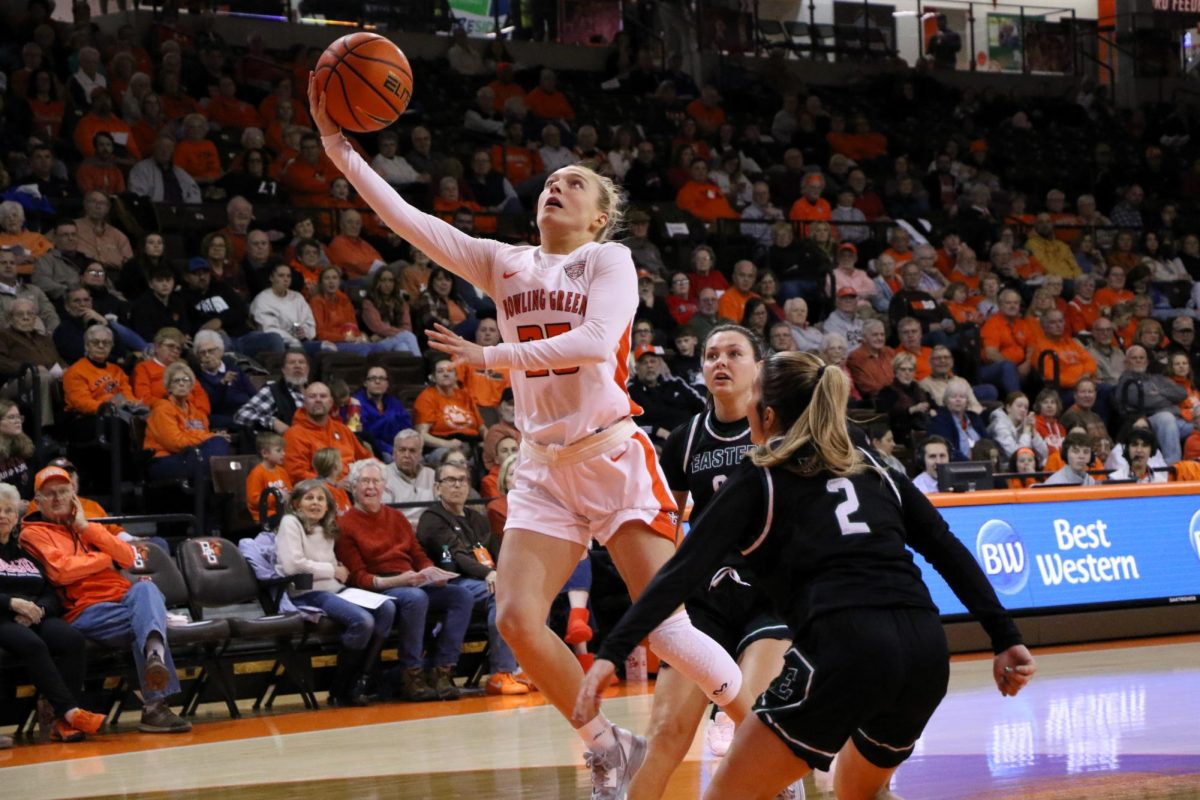 Bowling Green, OH - Falcons fifth year guard Lexi Fleming (25) taking a tough layup at the Stroh Center in Bowling Green, Ohio.