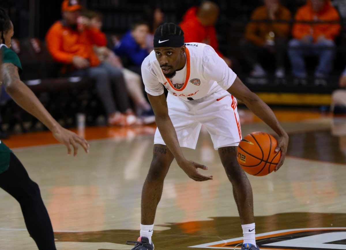 Bowling Green, Ohio- Falcons Senior Guard Trey Thomas (1) slows down to take control of the possession against the Eagles.