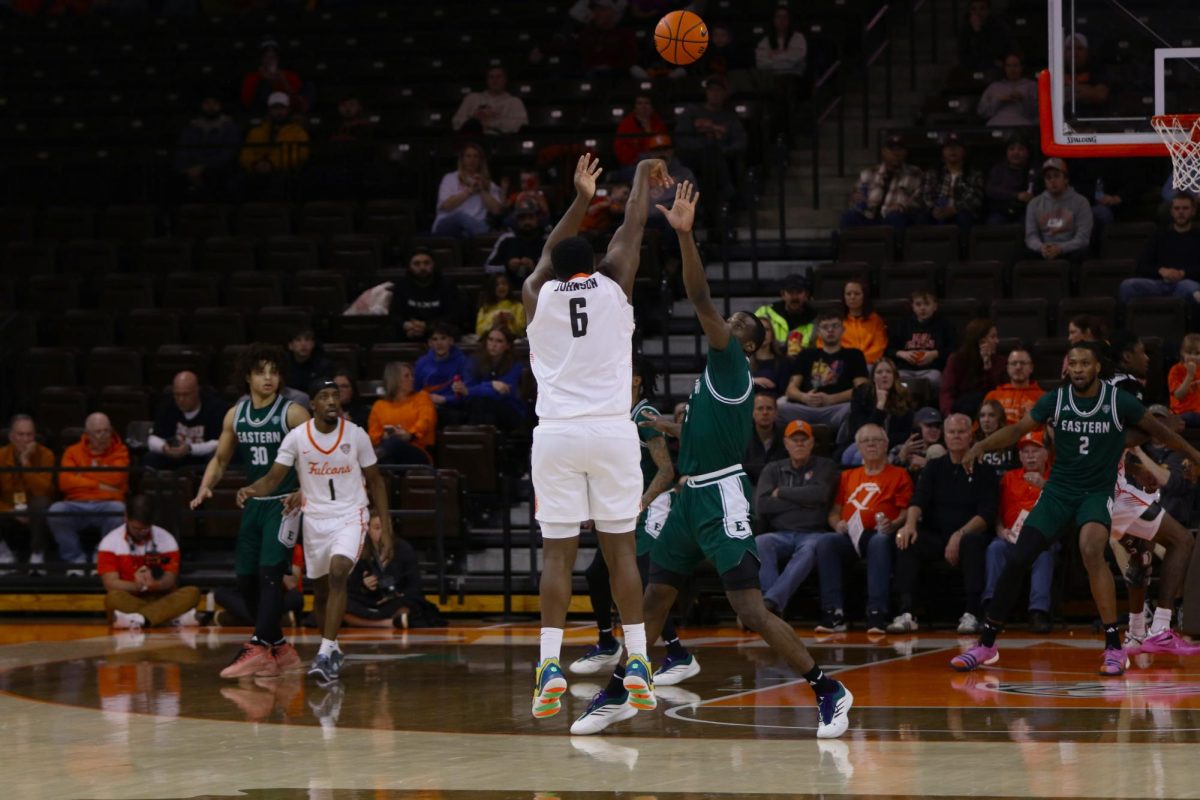 Bowling Green, Ohio- Falcons Senior Forward Marcus Johnson (6) drains a three in the final minutes of the second half against Eastern Michigan.