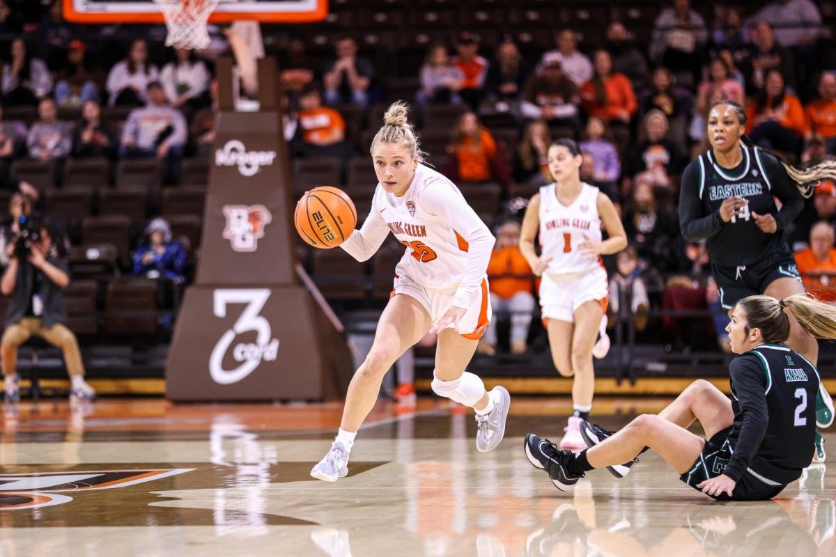 Bowling Green, OH - Falcons fifth year guard Lexi Fleming (25) makes a fast break after stealing the ball from the Eagles at the Stroh Center in Bowling Green, Ohio.