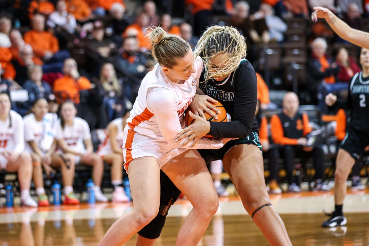 Bowling Green, OH - Falcons junior forward Kristiana Kulachovska (4) fights for the ball in the final minutes against Eastern Michigan University at the Stroh Center in Bowling Green, Ohio.