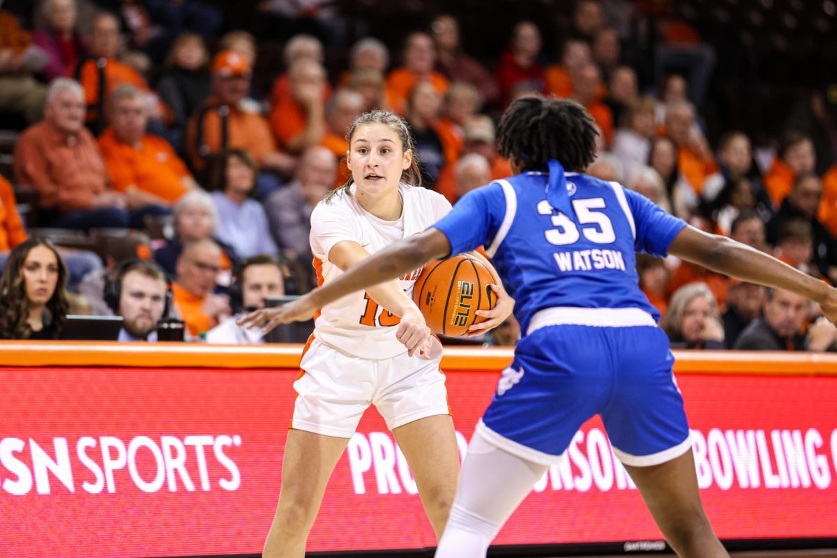 Bowling Green, OH - Falcons sophomore guard Paige Kohler (10) calls for a screen against a Buffalo Bulls player at the Stroh Center in Bowling Green, Ohio.