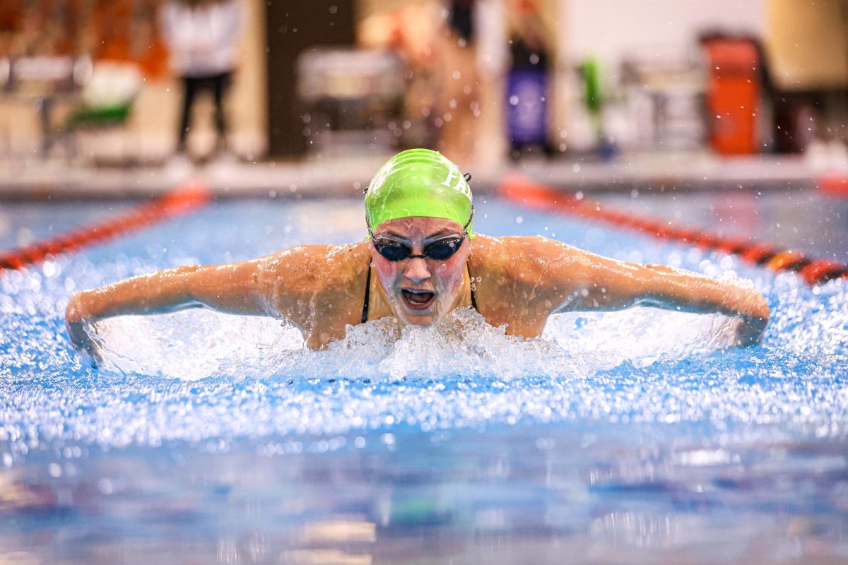 Bowling Green, OH - Falcons graduate student Ava Vial swims the 200 butterfly in a contest against the Thundering Herd at the Cooper Pool in Bowling Green, Ohio.