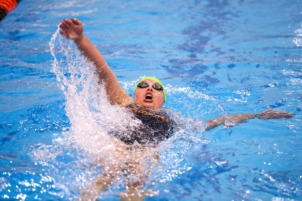 Bowling Green, OH - Falcons junior Hanna Ehrman swims the 200 backstroke against Marshall at the Cooper Pool in Bowling Green, Ohio.