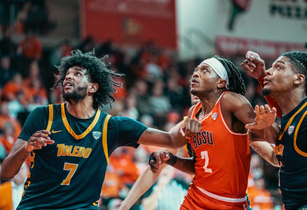 Bowling Green, OH – Falcons Junior Guard Javontae Campbell (2) prepares to rebound a free throw against multiple Rocket defenders at the Stroh Center in Bowling Green, Ohio