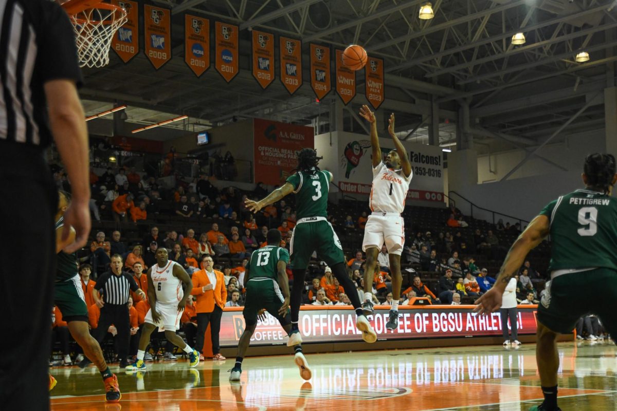 Bowling Green, OH - Falcons senior guard Trey Thomas (1) taking a jumper from the free throw line at the Stroh Center in Bowling Green, Ohio.