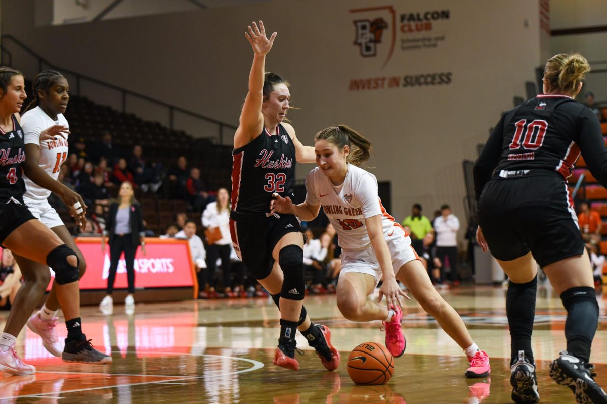 Bowling Green, OH - Falcons sophomore  guard Paige Kohler (10) driving to the hoop at the Stroh Center in Bowling Green, Ohio.