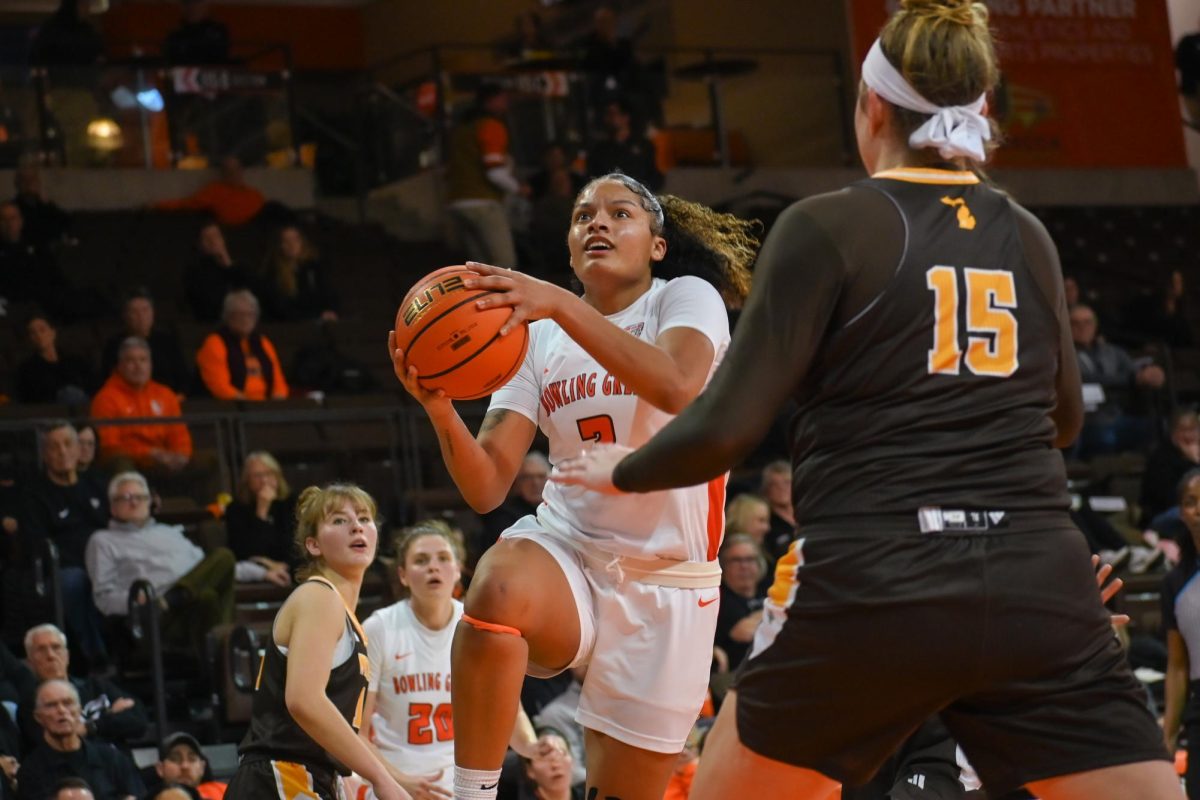 Bowling Green, OH - BGSU freshman guard Johnea Donahue (3) goes up for a layup against Western Michigan in Bowling Green, Ohio.