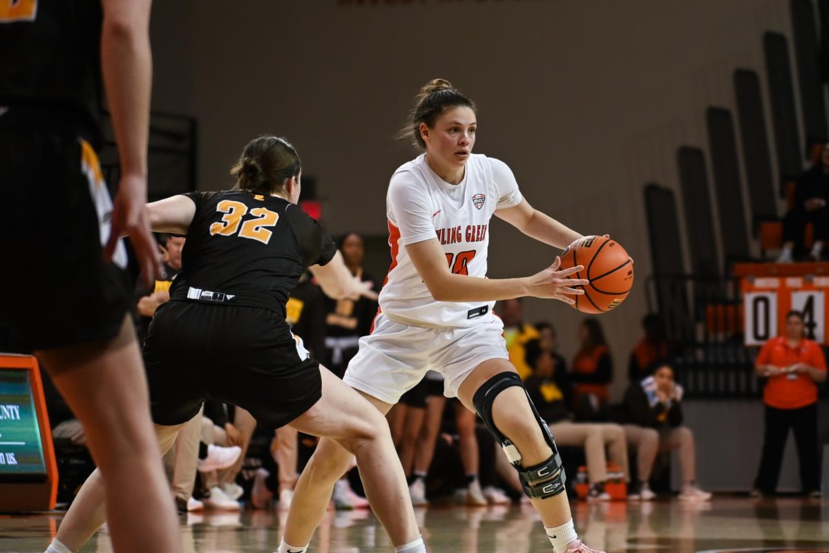 Bowling Green, OH - BGSU Jasmine Fearne (20) looks for a pass to her teammate in Bowling Green, Ohio.