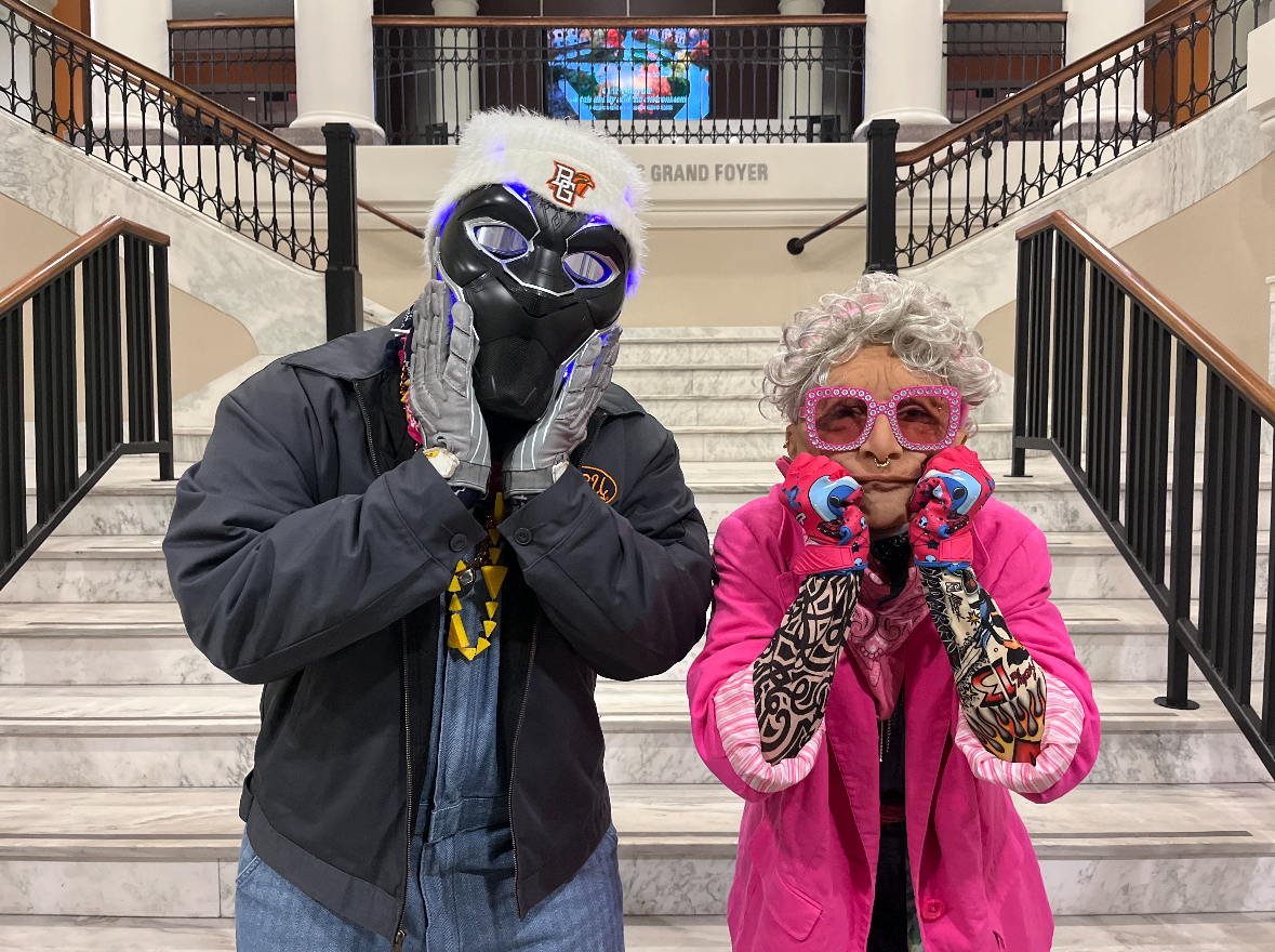 Black Panther and Granny prepare to be unmasked. 