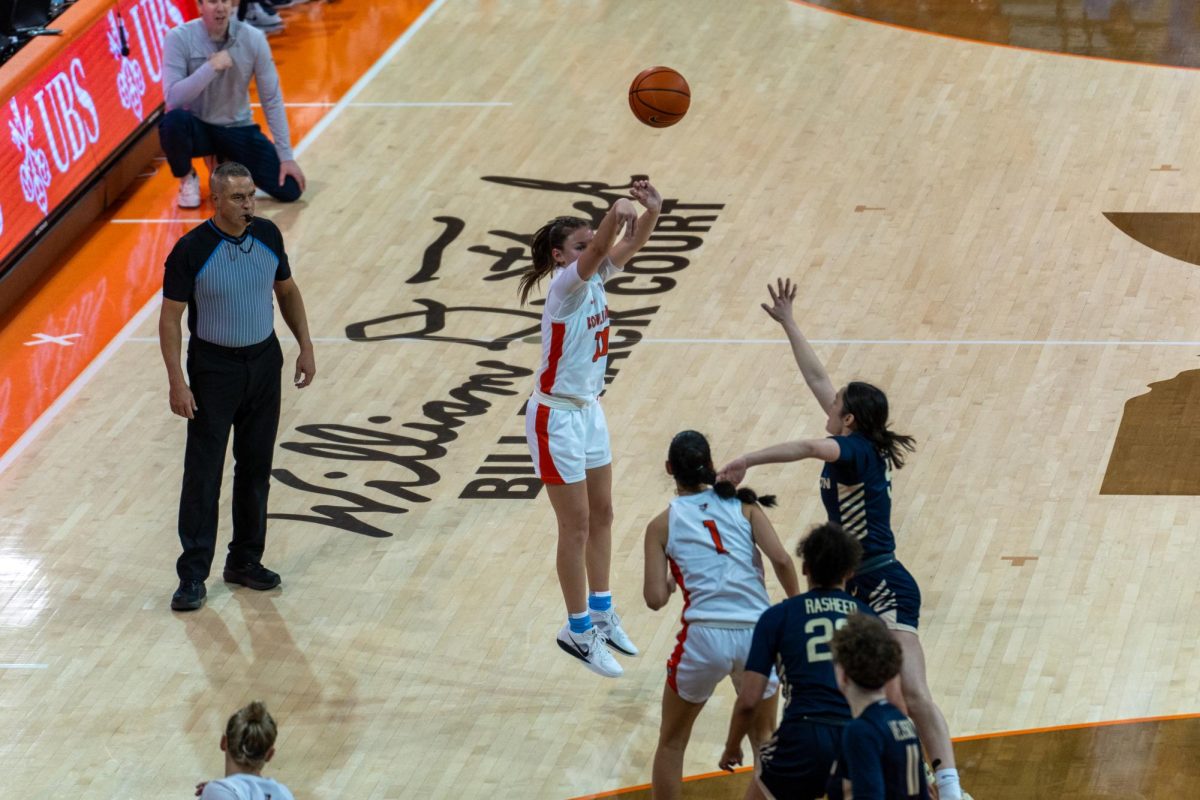 Bowling Green, OH- Falcons sophomore guard Paige Kohler (10) takes a deep 3 point shot against the Akron Zips at the Stroh Center in Bowling Green, Ohio.